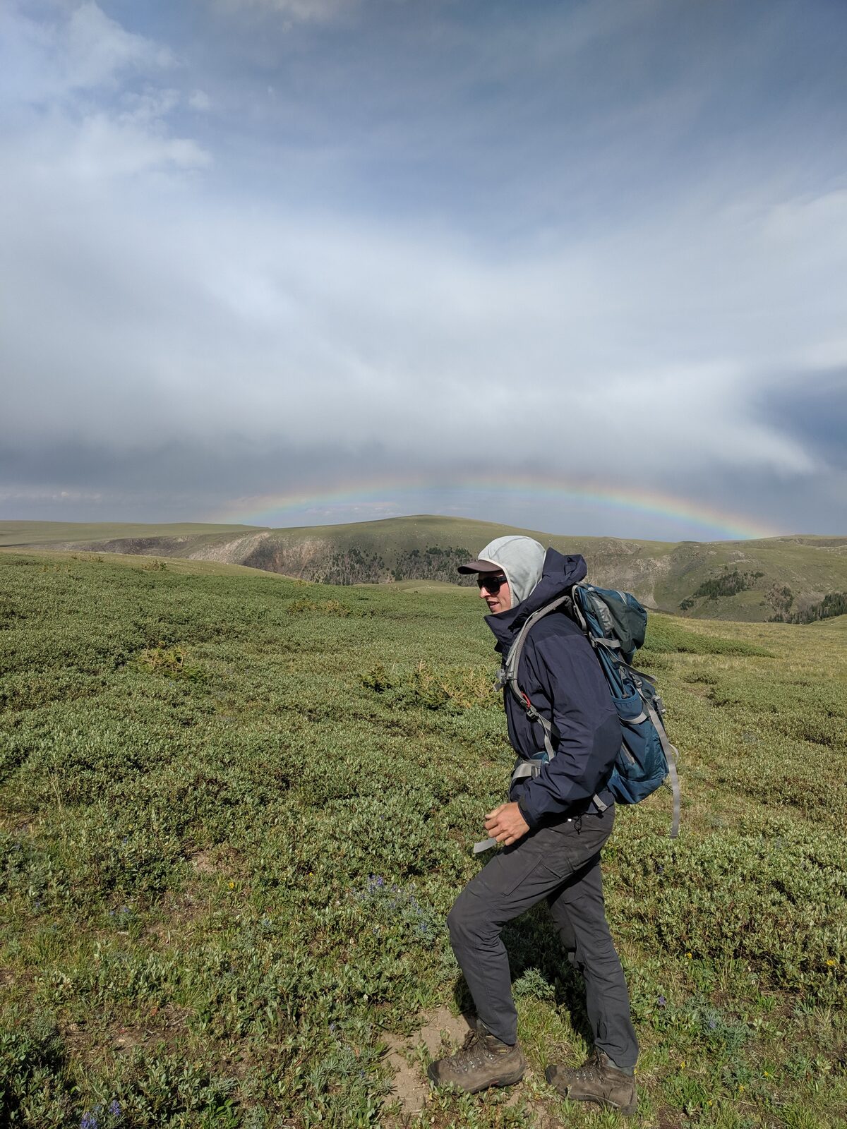 Chris Kussmaul hiking across the Beartooth Plateau, Montana