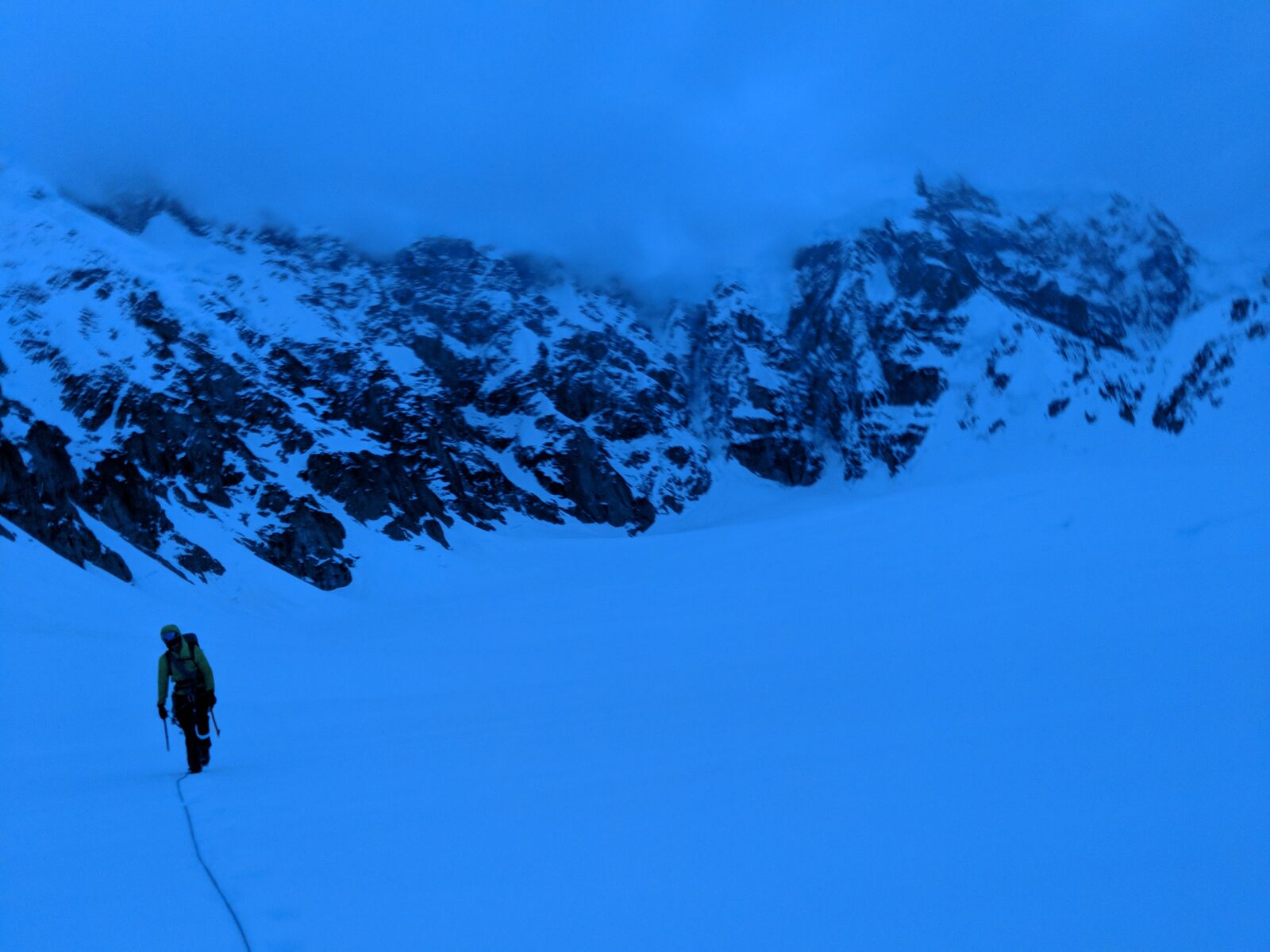 Matias searching for a safe exit from the hanging glacier during the descent