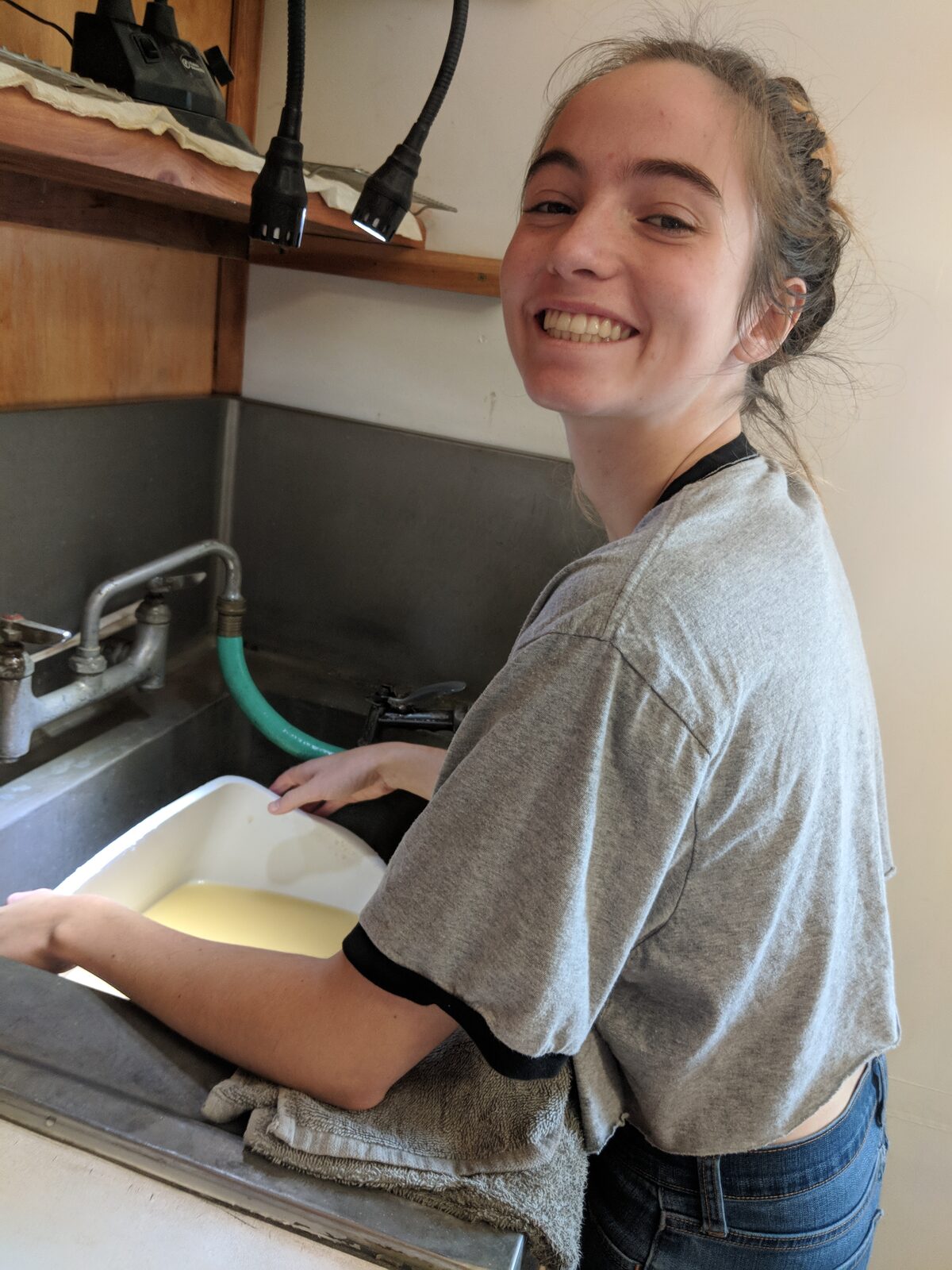 Saré Campbell separating zircon in the lab