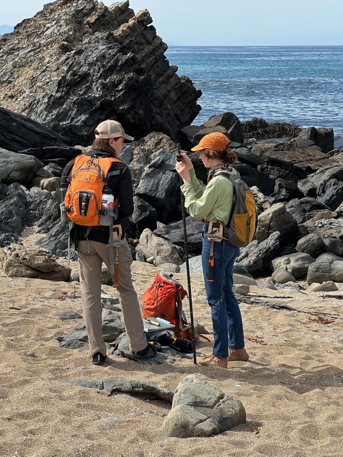 Tiana and Parker measuring a stratigraphic section of the Los Molles Formation