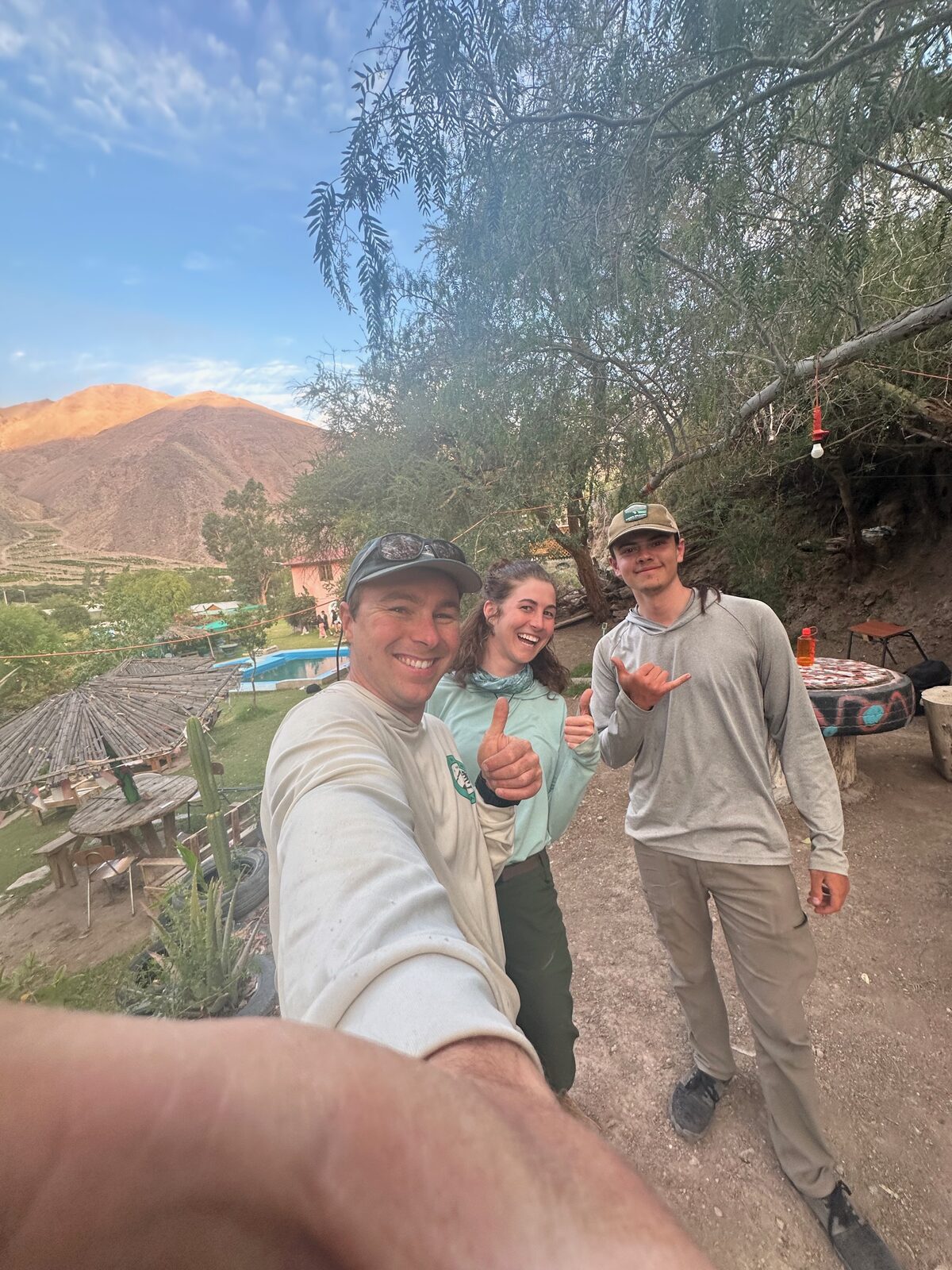 Group selfie at a campsite in the High Andes